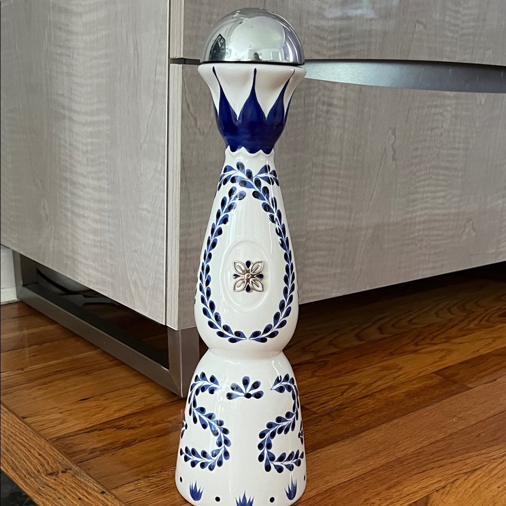 Blue and White Ceramic Bottle with Silver Top